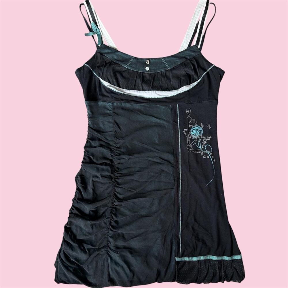 La mode est a vous Black & white mini bubble dress with blue floral embroidery